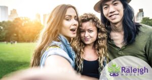 Group of friends taking a selfie after addiction rehab