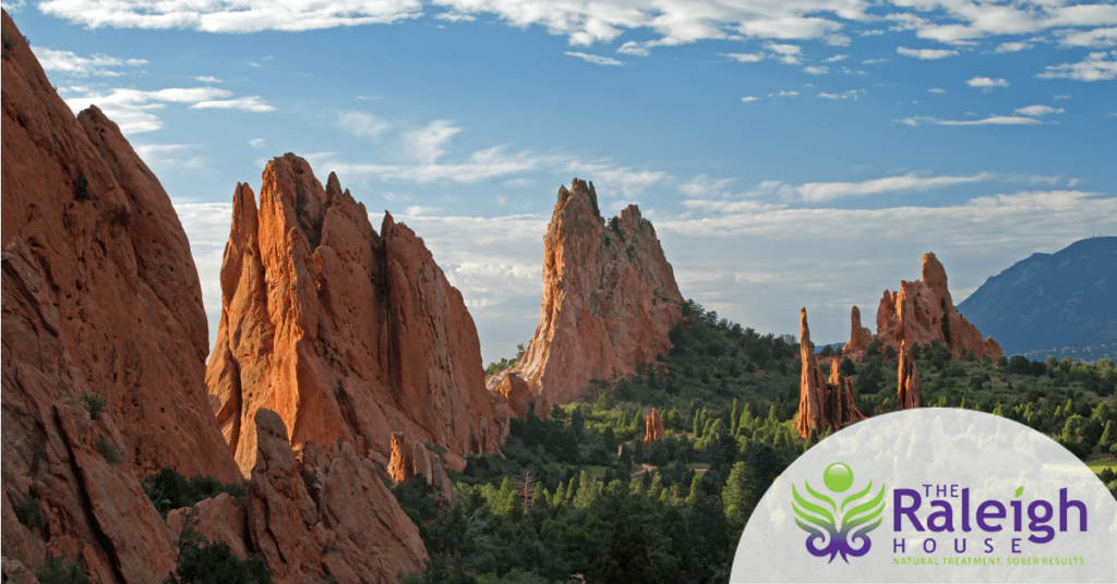 Sandstone rock formations set against the backdrop of bright, blue skies.