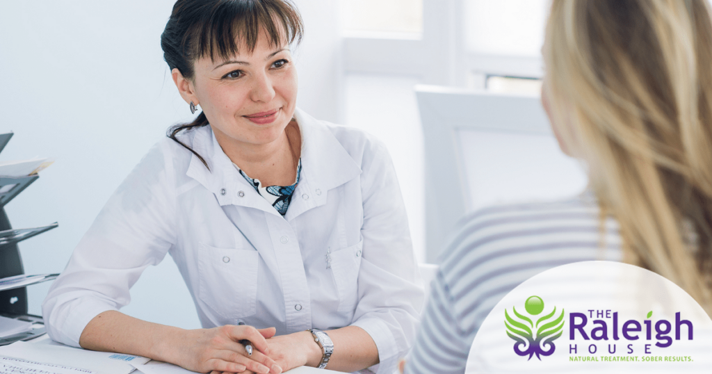 A female doctor smiles at her patient. 