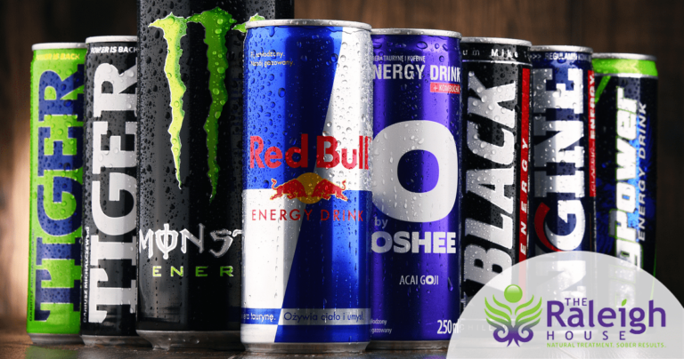 Collection of caffeinated energy drinks lined up to depict caffeine addiction.
