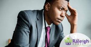 A businessman stresses out about his job.