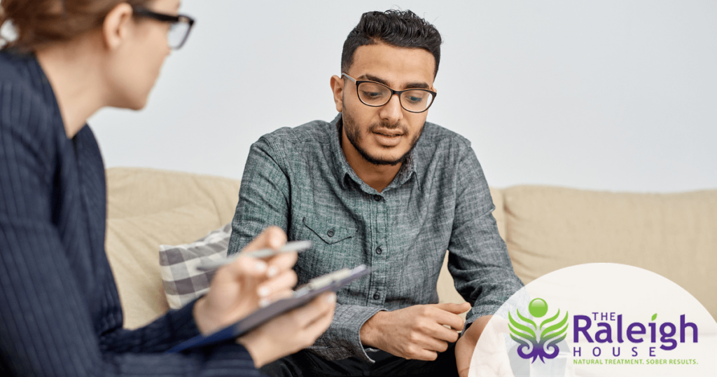 A man sits in a therapy session.