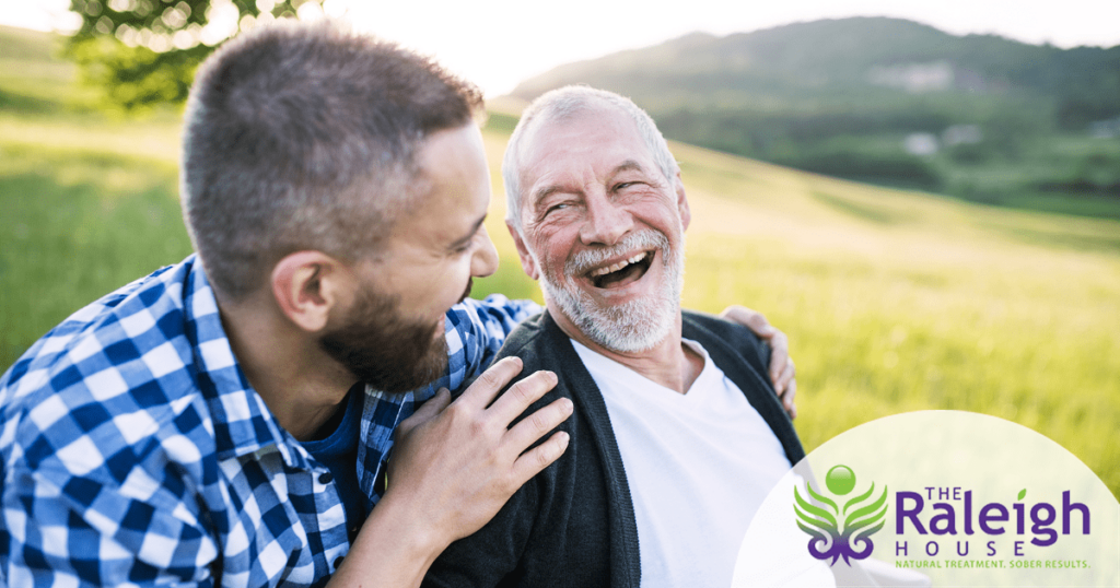 A father and his adult son enjoy the great outdoors together as the sun shines.