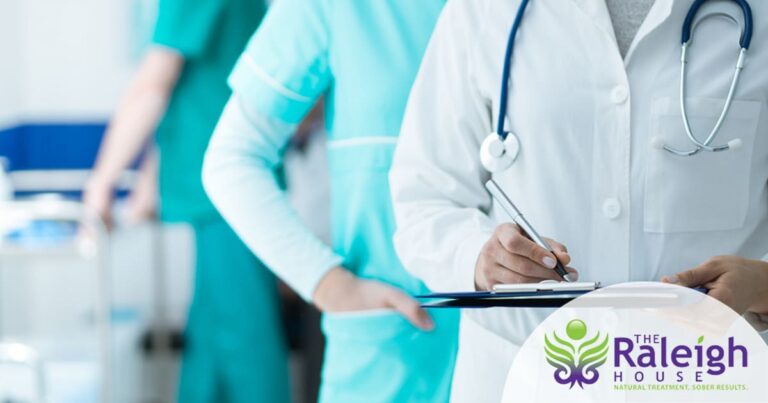 Doctors checking medical records.