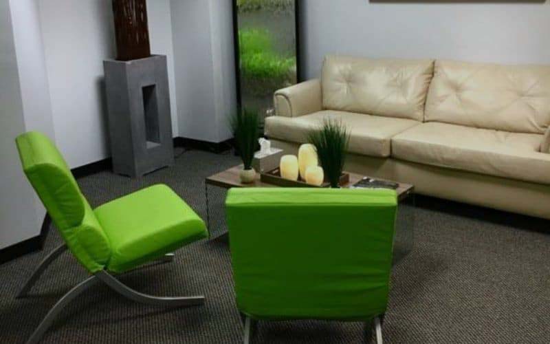 Waiting area with chairs and couch
