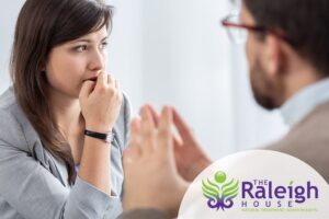 A woman working through her trauma and substance abuse during an individual therapy session.