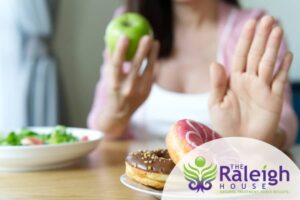 A woman choosing healthy foods over sugar while she’s recovering from drug addiction.