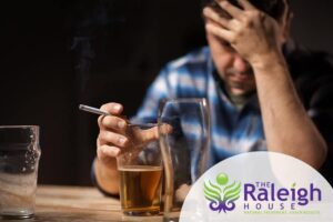 A man sitting at a bar, unable to stop drinking.