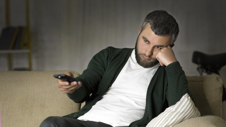 A man in addiction recovery struggling with social isolation and boredom.