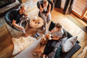 A group of people spending time together in a sober living house.