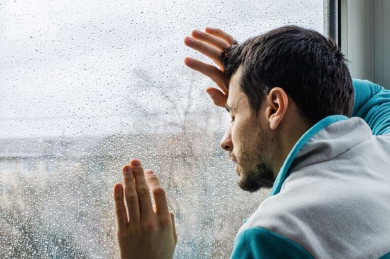 A man thinking about leaving drug rehab early.