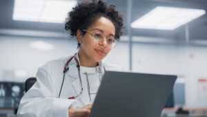 Doctor doing research on the computer